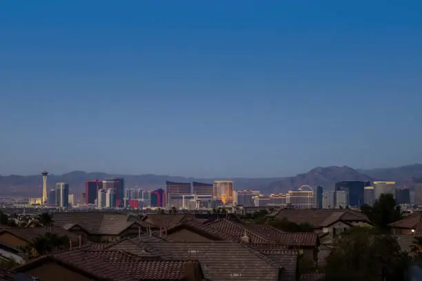 A view of the world famous Las Vegas Strip with homes in the foreground