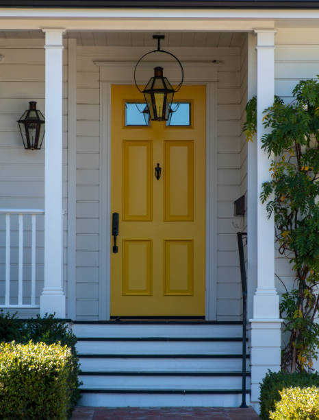 Porch and yellow door stock photo