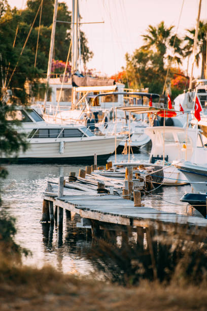 istock Wooden Pier and Moored Boats 1406974872