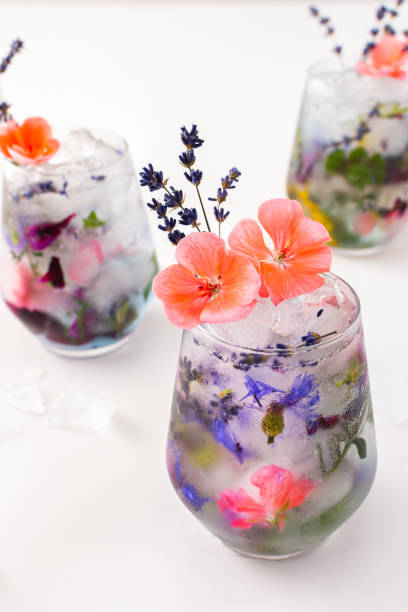 Cold drink with frozen flowers