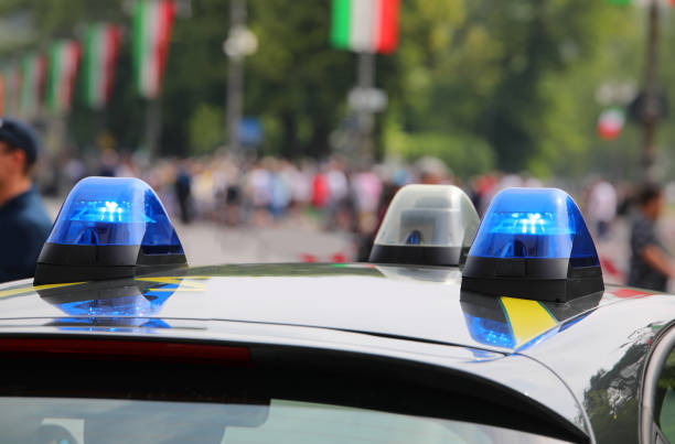 istock police car during the protest in the city square 1406978741