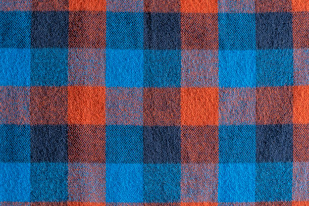 Abstract blue and red checkered fabric background or texture