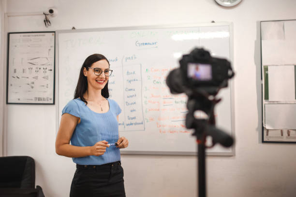 istock Young female teacher holding online class 1406988109