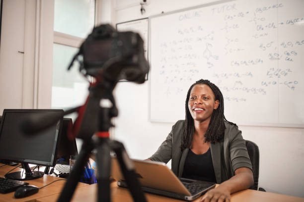 istock Black female teacher holding online class 1406988129