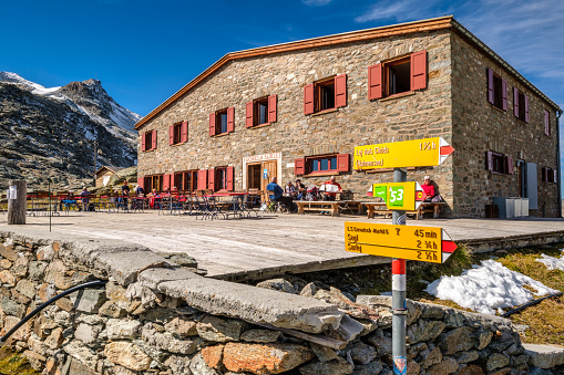 Mountain House Fuorcla Surlej, Switzerland – September  23, 2001: Mountain House Fuorcla Surlej is a mountain hut, situated on a breathtaking spot in Engadin with view on Piz Bernina and Piz Roseg.