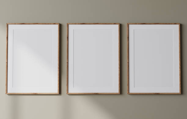 istock Frame mockup, three posters on green wall interior background, minimal design 1406990348