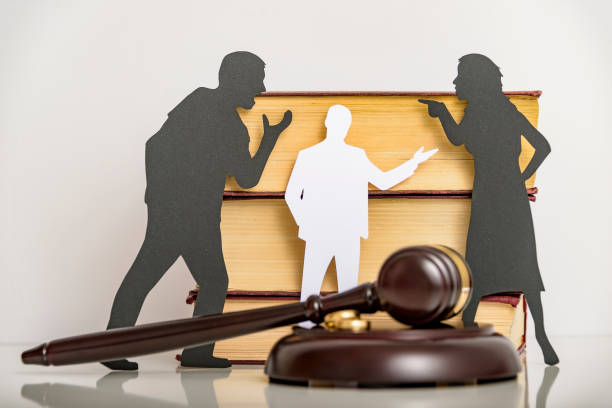 Silhouette symbol. Child custody. Family law proceedings. Divorce mediation, legal separation. stock photo