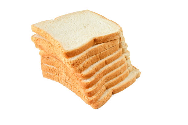 istock Slices of white square shaped bread isolated on white background 1406992216