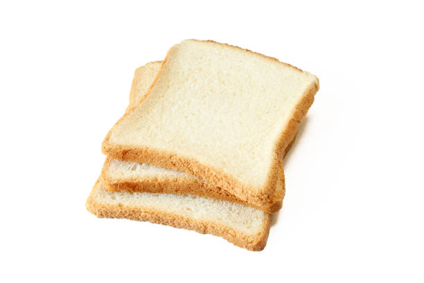 istock Slices of white square shaped bread isolated on white background 1406992280
