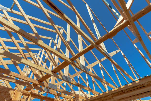 istock Triangle beams making up the structure of the roof 1406994989