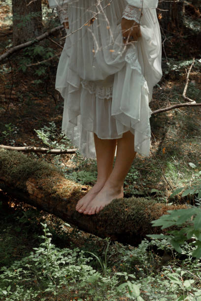 istock Nature, dress, forest, bare feet, moss 1406996088