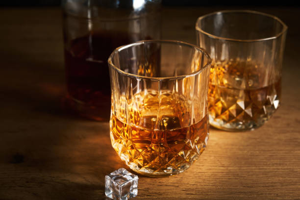 istock a bottle of cognac with two glasses 1406996248