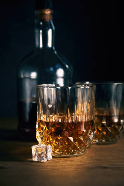 istock a bottle of cognac with two glasses 1406996249