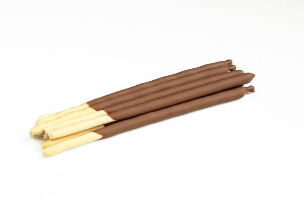 istock Biscuit sticks coated with milk chocolate. 1406996337
