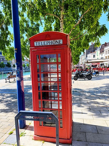 Red telephone booth in Verdun France on June 14 2022.