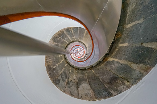 spiral staircase inside the capelinhos lighthouse, Faial island in the Azores archipelago.