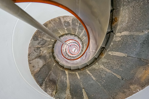 circular perspective of the stairs inside the capelinhos lighthouse, Azores archipelago.