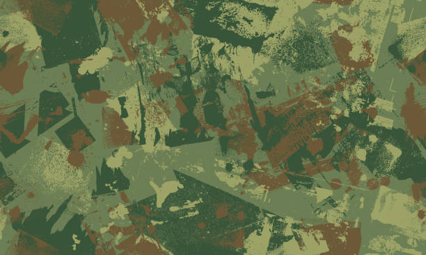 Seamless camouflaged wallpaper background Seamless green and brown camouflaged urban grunge wallpaper vector background disguise vector stock illustrations