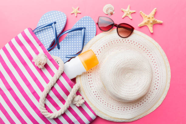 istock beach accessories flat lay top view on colored background Summer travel concept. Bag with starfish and sea shell. Top view 1407001409