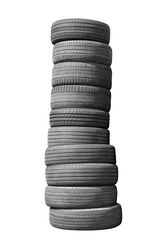 A stack of old, used car tires, isolated on white background.