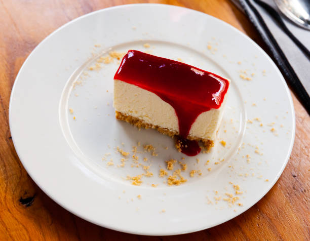 istock Slice of delicious  cheesecake with berries jam 1407002669