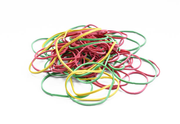 istock Bunch of colorful rubber bands isolated on white background. 1407002810