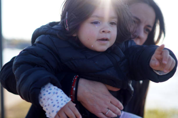 istock mother with her young daughter 1407003538