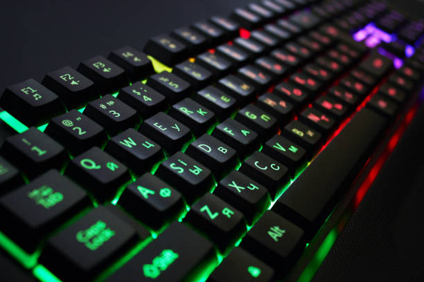 istock Gaming keyboard with RGB light on black 1407010806