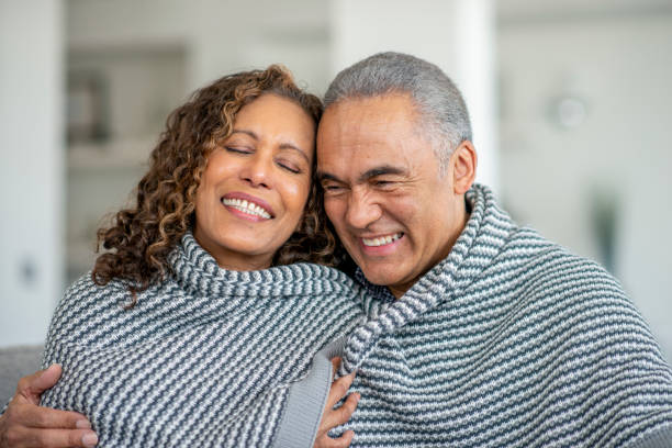 istock Senior Couple Embracing 1407017076