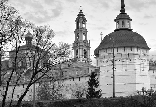 Domes of the Trinity-Sergius Lavra. The walls of the monastery with Orthodox churches and a bell tower of Russian architecture of the XVI-XVIII centuries. Sergiev Posad, Russia, 2022