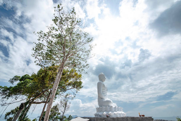istock Luang Pho Tanjai, a large white Buddha image located on Koh Tan, Samui, Thailand. 1407026578