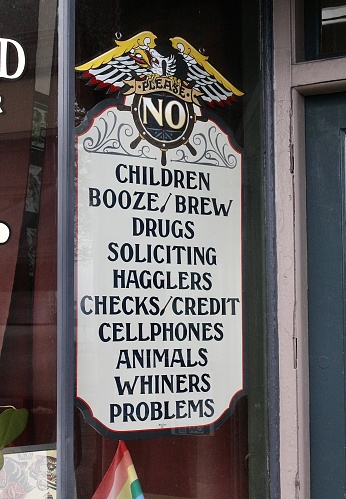 Funny sign on the outside of a business