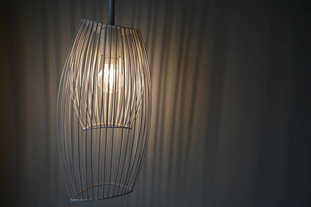 istock luxury lamp hanging on room with white curtain 1407036862