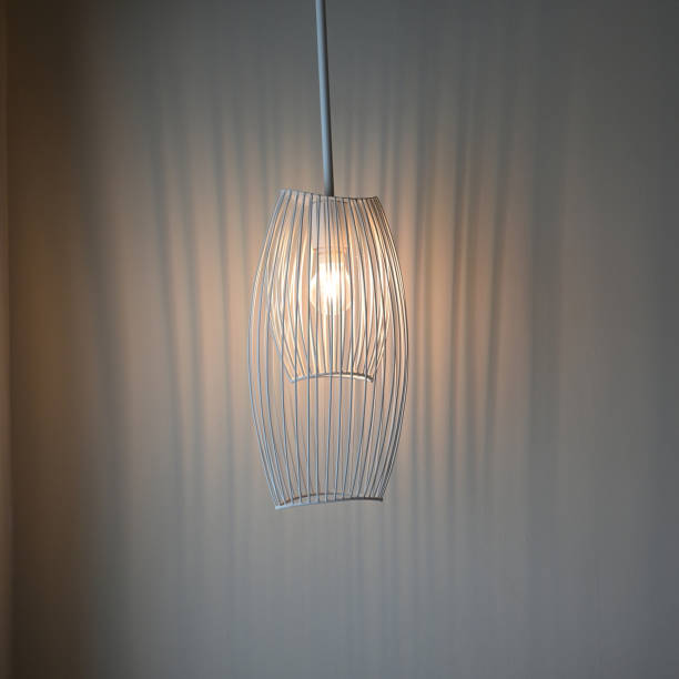 istock luxury lamp hanging on room with white curtain 1407036865