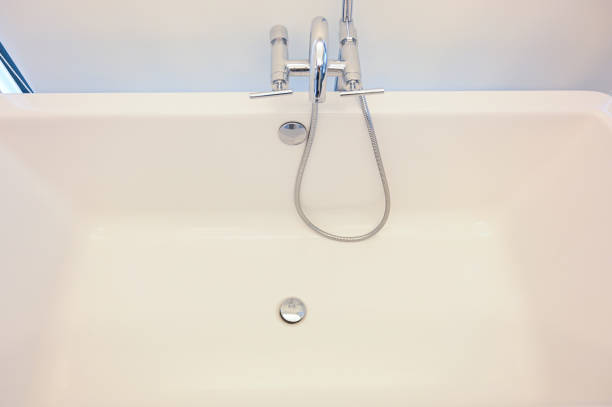 istock hydrant shower with bathtub in bathroom 1407036897