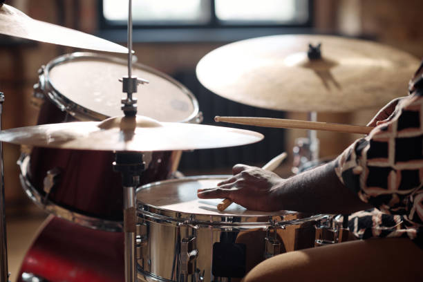 istock Drummer playing rock music at studio 1407039027