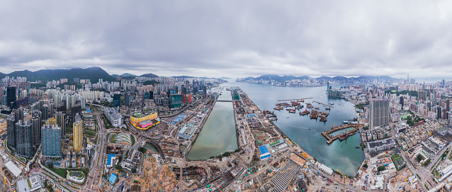Epic panorama of huge construction site in the Kai Tak area, Kowloon, Hong Kong, daytime