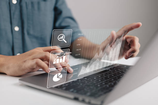 istock The ideas behind business intelligence and big data analytics. There are financial charts on a virtual screen. 1407050413