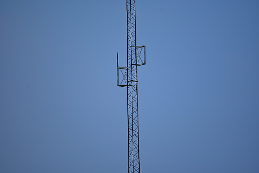 large antenna tower with antenna mounts
