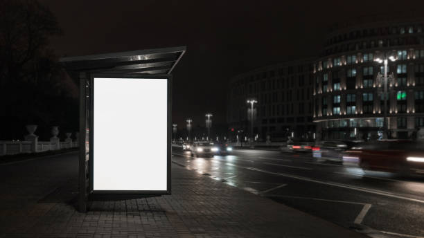 vertically white empty lightbox on side of bus stop - bus stop imagens e fotografias de stock