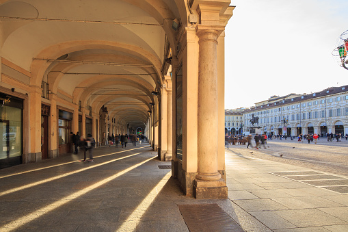 Turin square, Piazza San Carlo arches at sunset