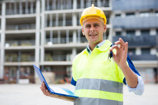 istock Engineer showing keys from new apartment 1407064162