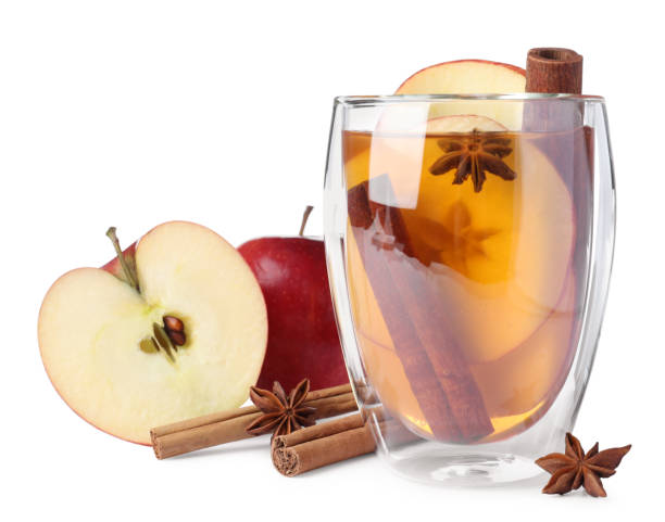 istock Hot mulled cider and ingredients on white background 1407066884