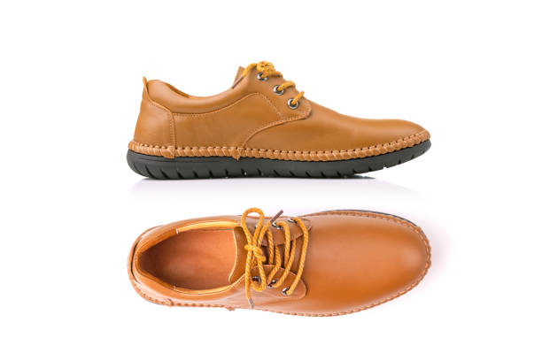 Close-Up Of Shoe Against White Background