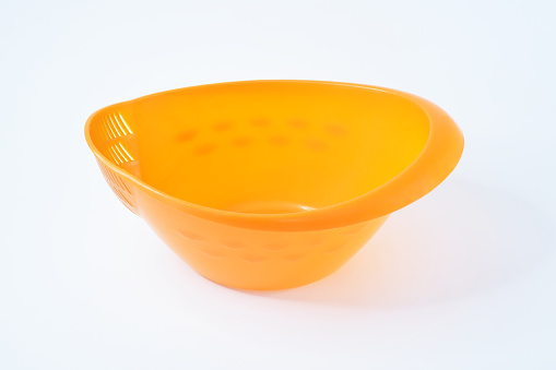 Empty plastic container on the white background