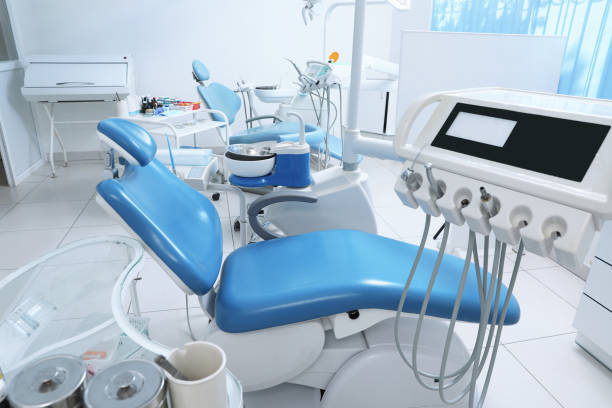istock Dentist's office interior with chair and modern equipment 1407070491