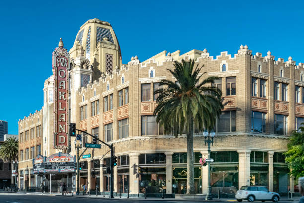 The morning sun rises on the iconic Fox Oakland Theatre, a concert hall and former movie theater in Downtown Oakland. stock photo