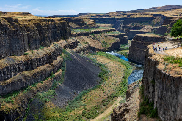 istock powerful and beautiful Palouse Falls dropping its powerful water in a basin  in Snake River along a canyon in east Washington. 1407074533