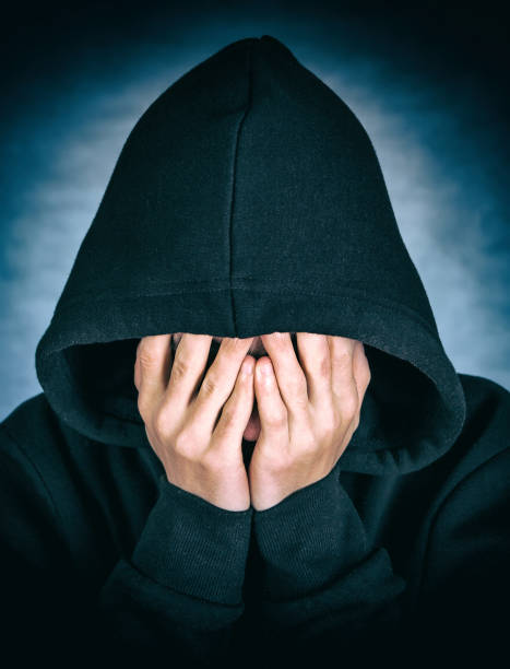 istock Sad Man in the Hood 1407075741