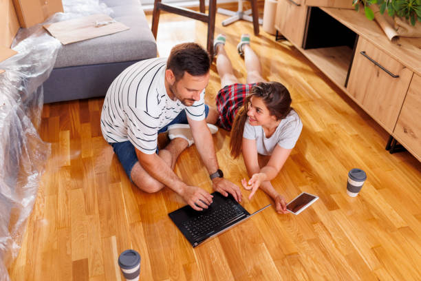 istock Couple searching for home redecoration ideas 1407075809